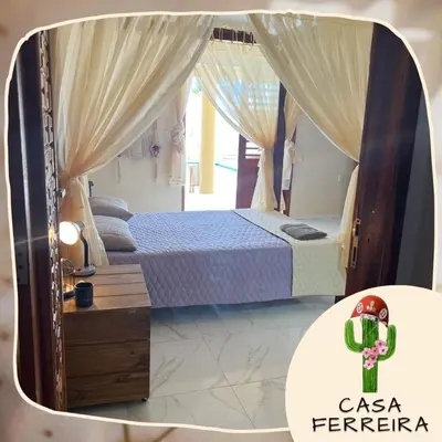 Uma cama ou camas num quarto em Casa Ferreira Cumbuco