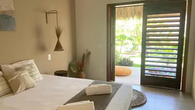 Uma cama ou camas num quarto em Casa Pura Vida - Icaraizinho