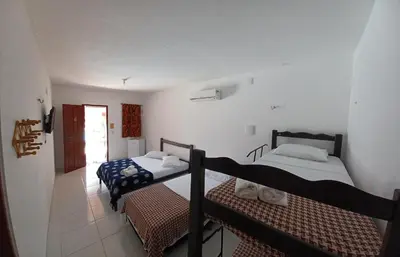 Uma cama ou camas num quarto em Manitu Flat Canoa Quebrada