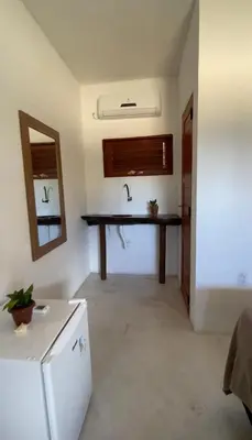 A cozinha ou kitchenette de Suíte Paradise