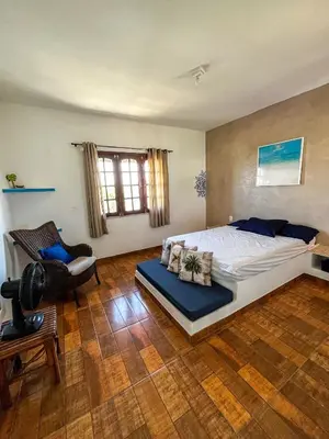 Uma cama ou camas num quarto em Casa Egípcia em Morro branco - na quadra da praia