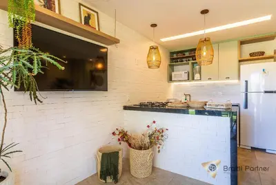 A cozinha ou kitchenette de Taíba Beach Resort - Apartamento Encantador!
