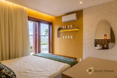 Uma cama ou camas num quarto em Taíba Beach Resort - Apartamento Encantador!
