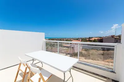 Uma varanda ou terraço em Beach Townhouses - Duplex com Jacuzzi by Carpediem