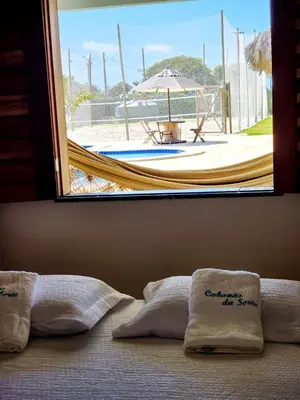 Uma cama ou camas num quarto em Cabanas da Sorte