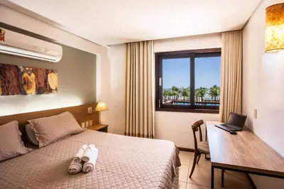 Uma cama ou camas num quarto em [KaririBeach319A] Flat 1q com vista maravilhosa