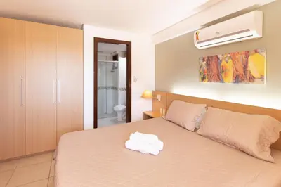 Uma cama ou camas num quarto em [KaririBeach319A] Flat 1q com vista maravilhosa
