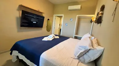 Uma cama ou camas num quarto em Isla Beach Hotel
