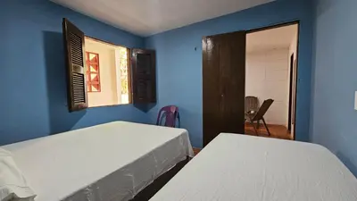 Uma cama ou camas num quarto em Chalé Verdelândia Guaramiranga - Apartamento com 2 quartos