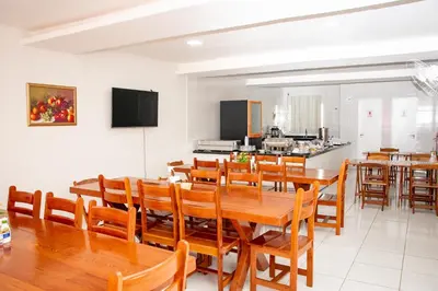 Uma televisão e/ou sistema de entretenimento em Hotel Letiva Centro