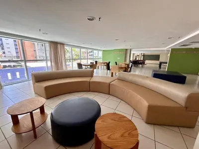 Uma área de estar em DN Apartamento VISTA MAR ,a 50 metros do aterro Praia Iracema