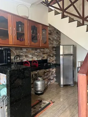 A cozinha ou kitchenette de Chalé Guaramiranga-CE