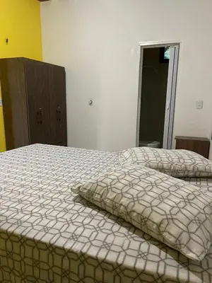 Uma cama ou camas num quarto em Dunas Bar&Hotel