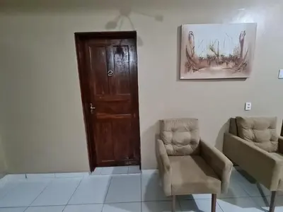 Uma área de estar em Pousada Meireles Praia