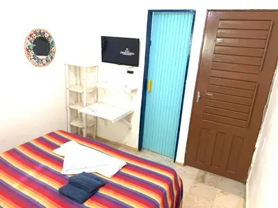 Uma cama ou camas num quarto em Maria Flor Pousada