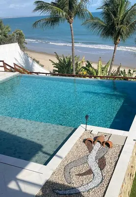 A piscina em ou perto de De Olho no Mar A única pousada de frente para o mar em Paracuru