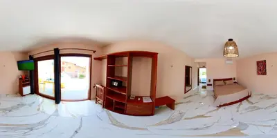 Uma cama ou camas num quarto em De Olho no Mar A única pousada de frente para o mar em Paracuru