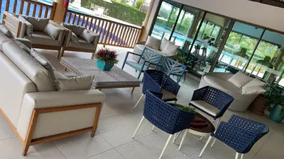 Uma área de estar em Apartamento B2 106