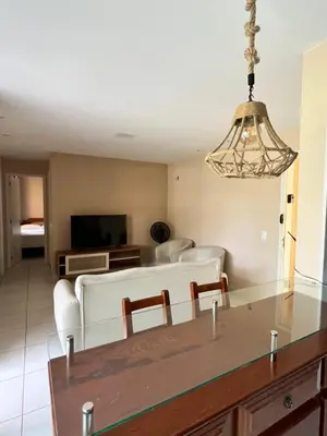 Uma televisão e/ou sistema de entretenimento em Apartamento B2 106