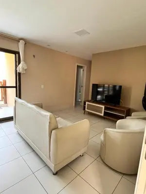 Uma televisão e/ou sistema de entretenimento em Apartamento B2 106