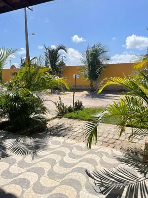 Um jardim no exterior de Casa 2 Gold Star Village