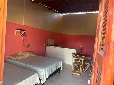 Uma cama ou camas num quarto em Casa 2 Gold Star Village
