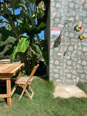 Um jardim no exterior de Casa 2 Gold Star Village