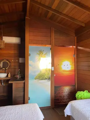 Uma cama ou camas num quarto em Pousada BANGALÔS SOL DE LAGOINHA