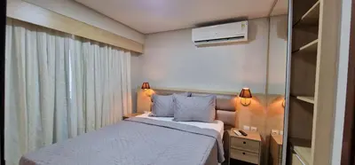 Uma cama ou camas num quarto em Beautiful Beachclass