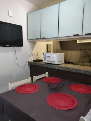 A cozinha ou kitchenette de Via Venetto Flat vista à beira-mar de Fortaleza