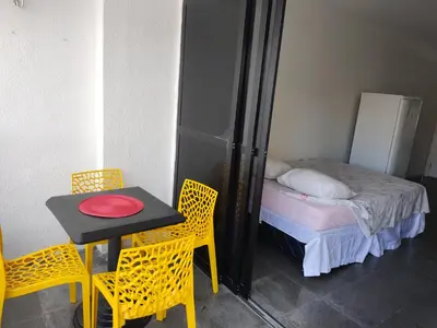 Uma cama ou camas num quarto em Via Venetto Flat vista à beira-mar de Fortaleza