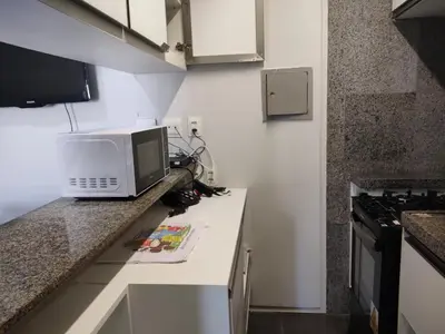 A cozinha ou kitchenette de Via Venetto Flat vista à beira-mar de Fortaleza