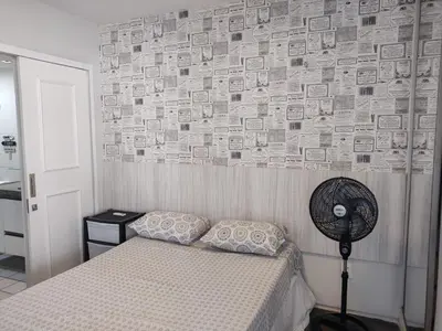 Uma cama ou camas num quarto em Via Venetto Flat vista à beira-mar de Fortaleza