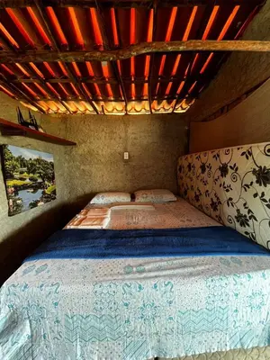 Uma cama ou camas num quarto em Cabana Dunas