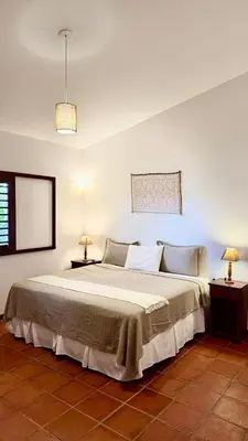 Uma cama ou camas num quarto em Vila Tao