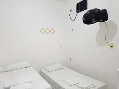 Uma cama ou camas num quarto em Casa Brisa