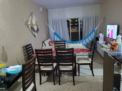 Uma área de estar em Encanto da Praia do Futuro 1