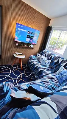 Uma cama ou camas num quarto em Pousada Aconchego no Frio