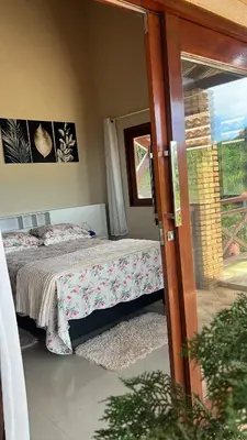 Uma cama ou camas num quarto em Belaninha