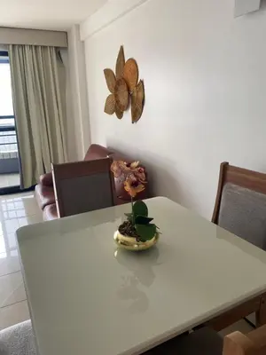 Uma área de estar em Flat com vista para o Mar