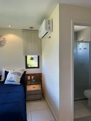 Uma televisão e/ou sistema de entretenimento em Bangalô frente ao mar Vg Sun Cumbuco