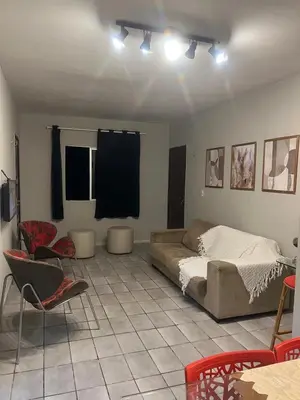 Uma área de estar em Apartamento Icaraí prox ao cumbuco