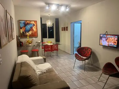 Uma televisão e/ou sistema de entretenimento em Apartamento Icaraí prox ao cumbuco