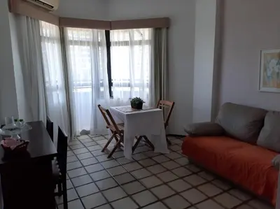Uma área de estar em Flat Golden Beira Mar 557