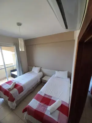 Uma cama ou camas num quarto em Cumbuco Residence - Beach