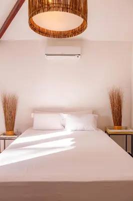 Uma cama ou camas num quarto em Refugios Parajuru - Casa Pequena
