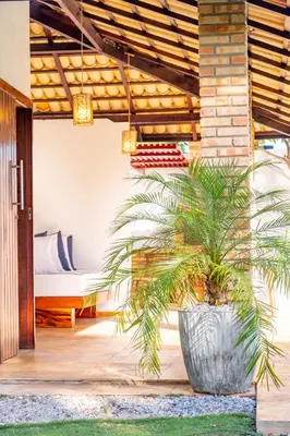 Um jardim no exterior de Refugios Parajuru - Casa Pequena