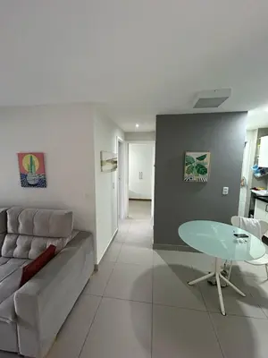 Uma área de estar em Apartamento a 50m da Beira Mar