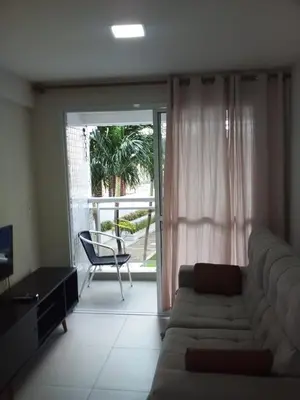 Uma área de estar em Apartamento a 50m da Beira Mar
