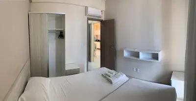 Uma cama ou camas num quarto em Apartment Cumbuco Residence